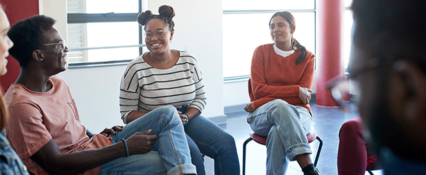 A group talking in group counseling.