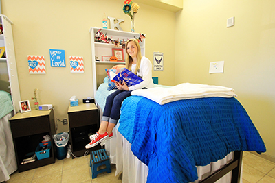 Colorful dorm room showing two beds