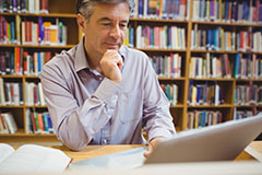 Man studying on laptop